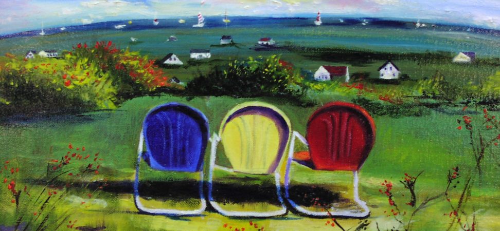 Three lawn chairs lined up facing a seaside landscape.